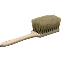 A wide shovel brush, tied